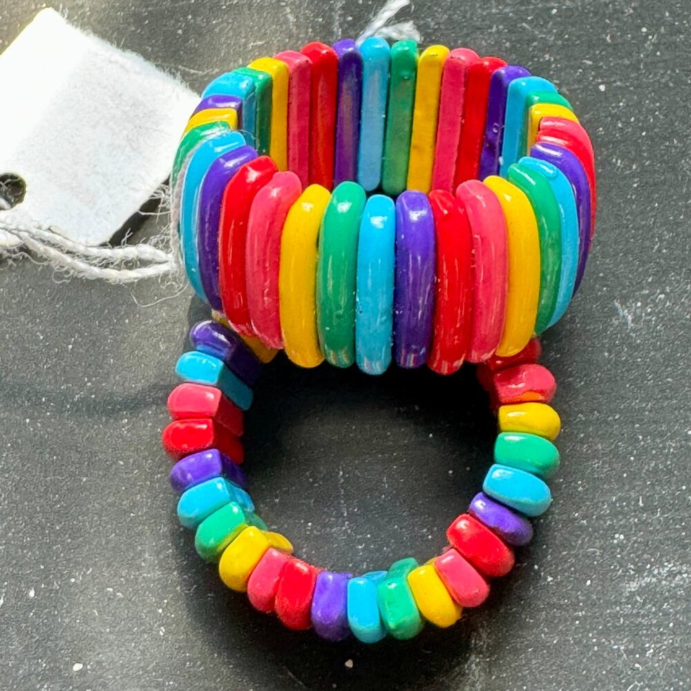 Welcome to June! A pair of Rainbow stretch rings.